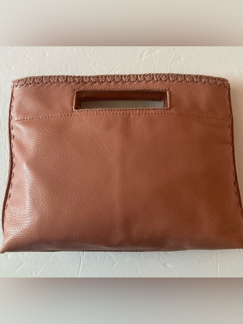 The Sak coral lite pink Leather Cutout-Handle Crossbody Clutch Hand Stitched
